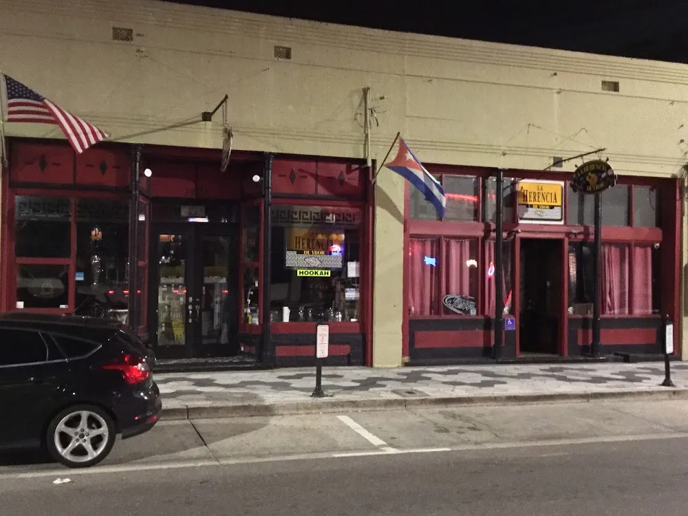 The red storefront of La Herencia de Ybor on 7th Avenue in Tampa