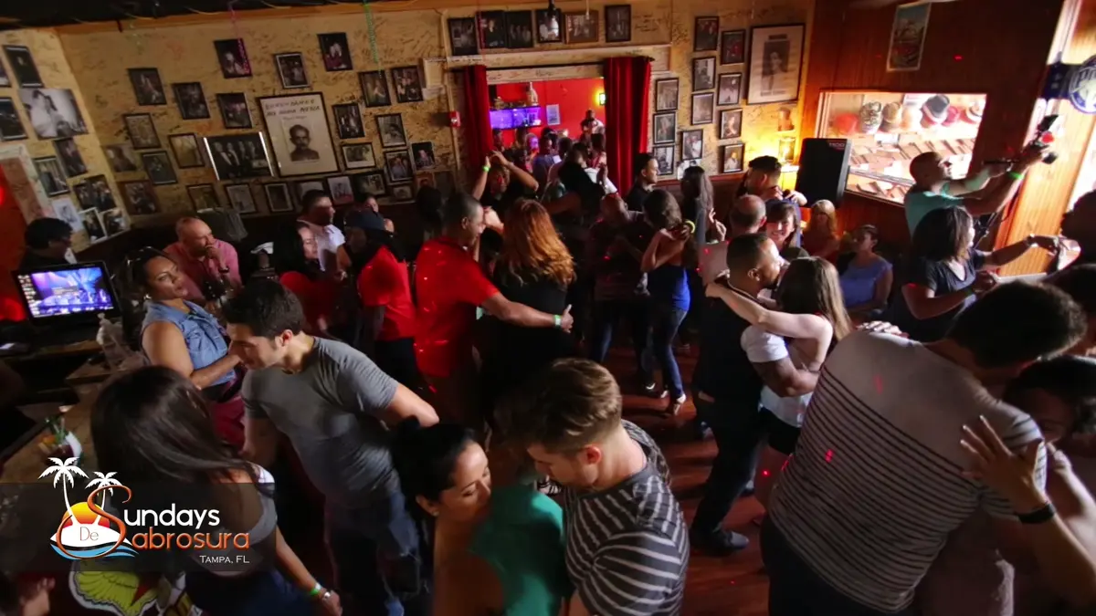 Dancers sharing an afternoon on the dance floor at Sunday de Sabrosura